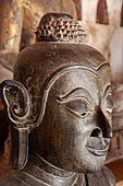 Vientiane, Laos - Wat Si Saket, The gallery around the sim houses thousands of Buddha statues in various mudras, dating  from the 16th century.